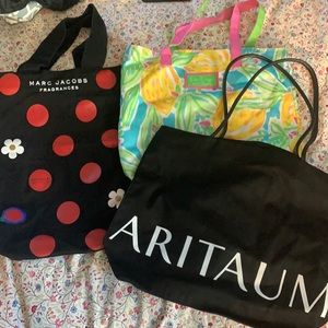 Bundle tote bags, one black one is new and 1 is used but good condition